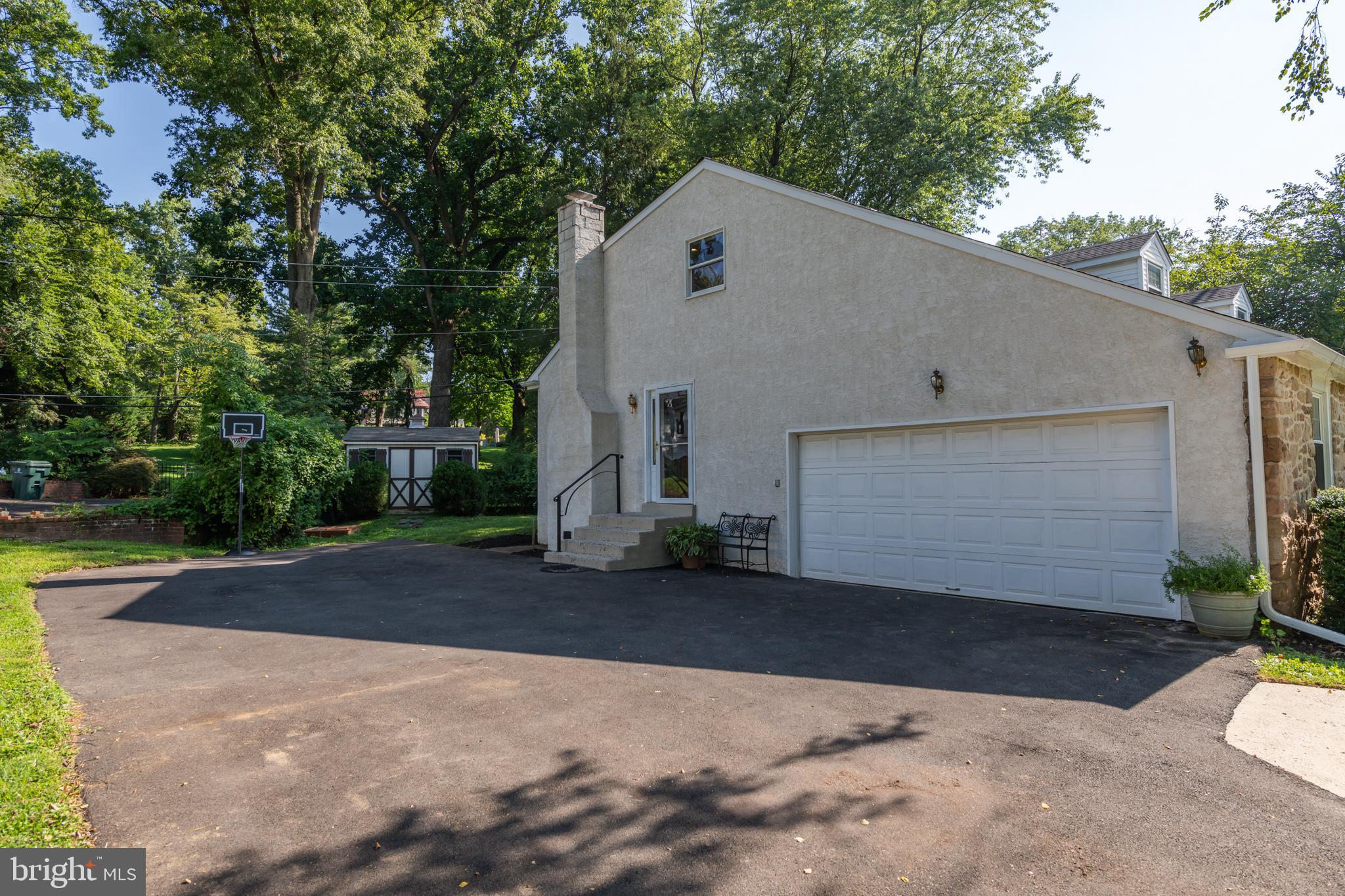 1165 Beverly Road Jenkintown, PA 19046 - Photo 31 of 31 a view of a house with a yard and garage