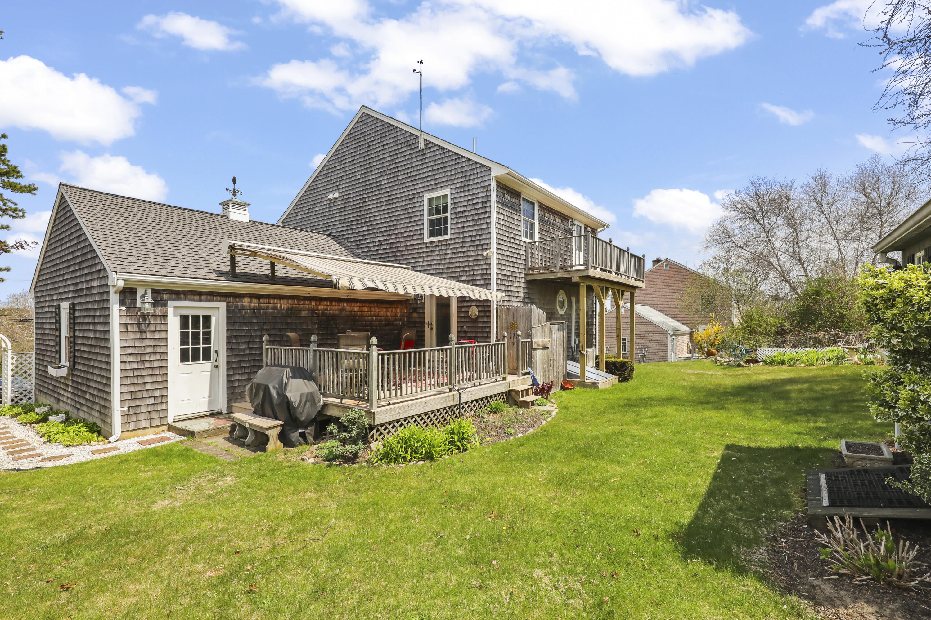 36 Town Neck Road Sandwich, MA 02563 - Photo 13 of 67 a view of a house with a yard