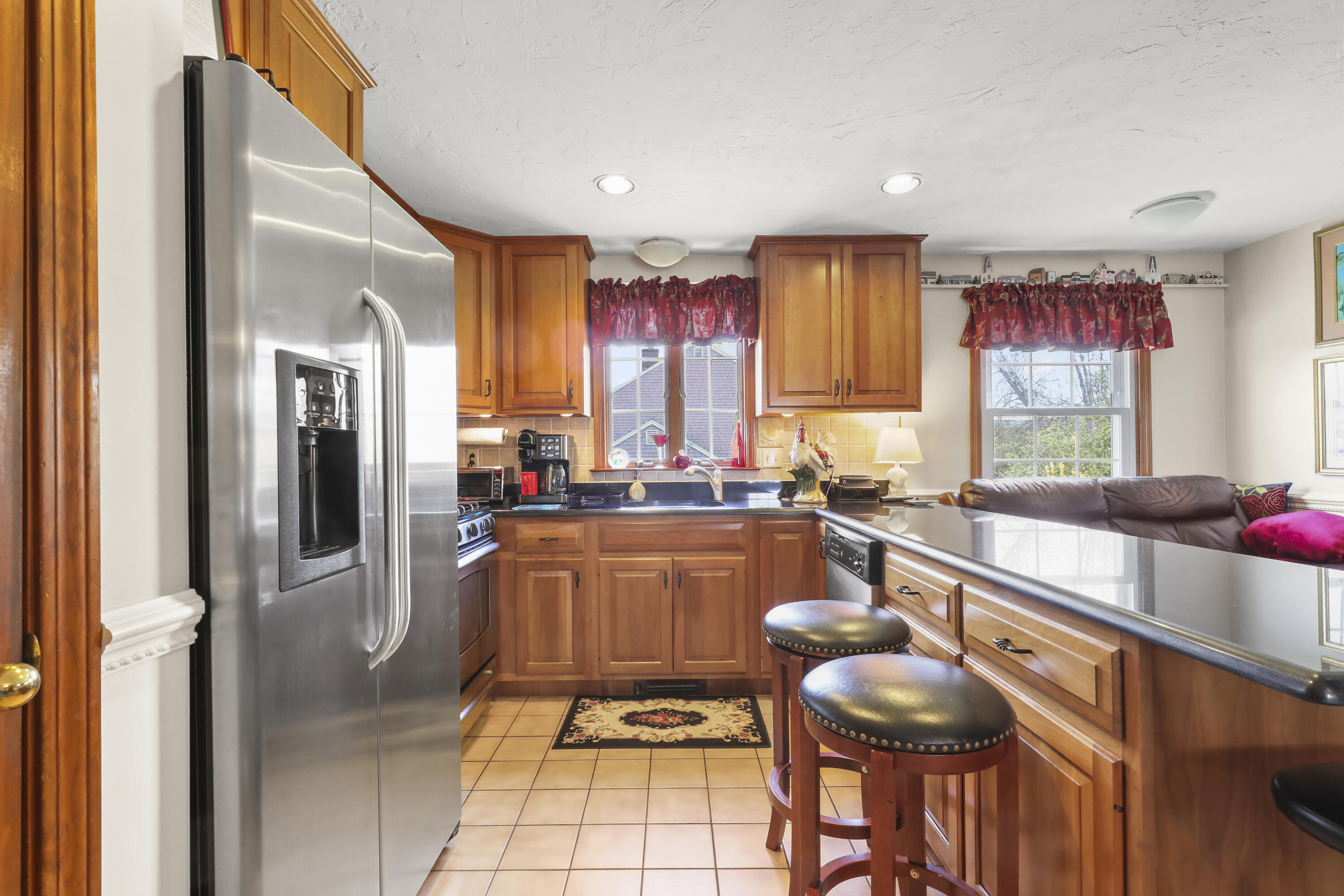 36 Town Neck Road Sandwich, MA 02563 - Photo 26 of 67 a kitchen with stainless steel appliances granite countertop a refrigerator and a sink