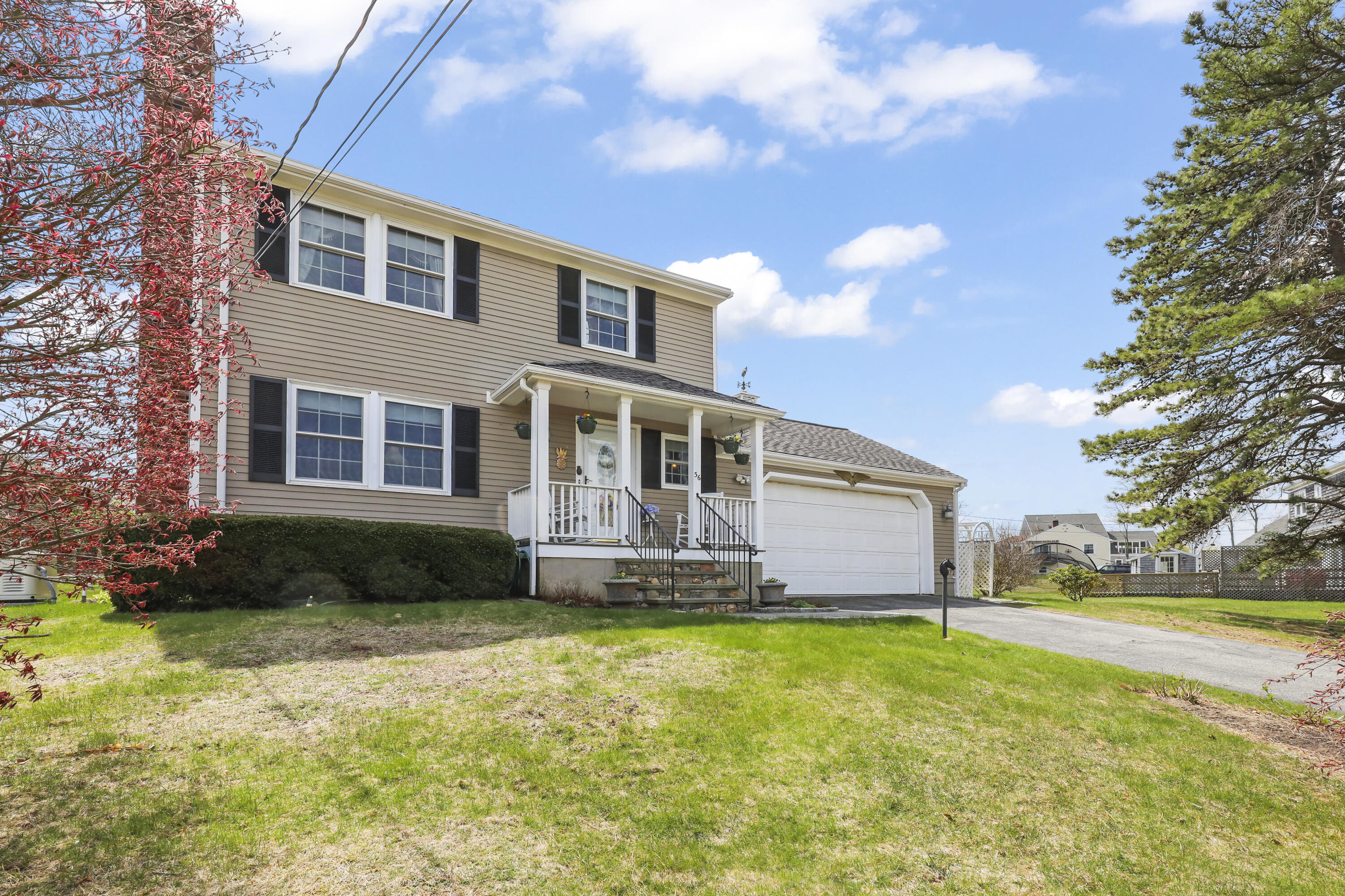 36 Town Neck Road Sandwich, MA 02563 - Photo 3 of 67 a front view of a house with a yard