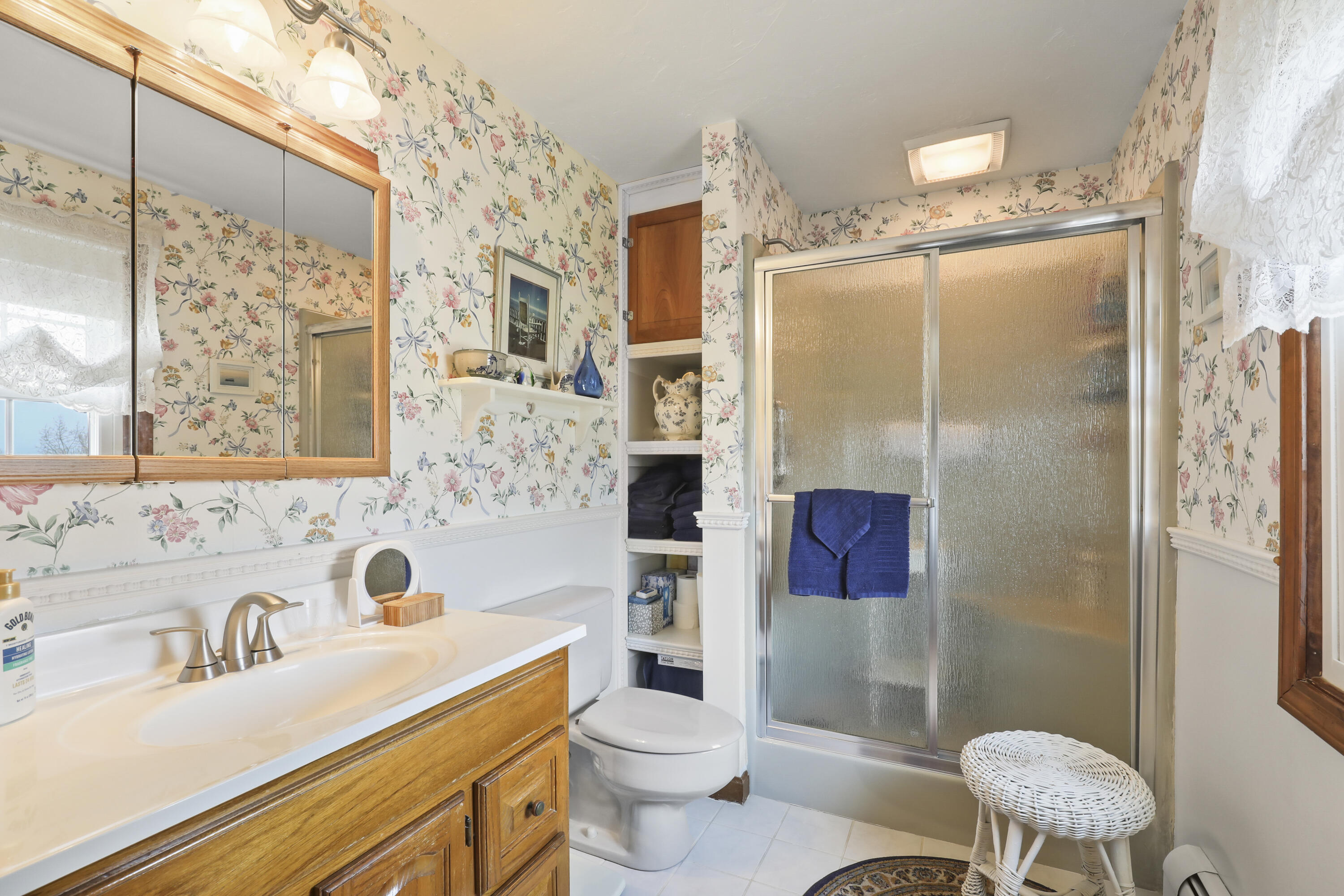 36 Town Neck Road Sandwich, MA 02563 - Photo 38 of 67 a bathroom with a sink toilet vanity and shower