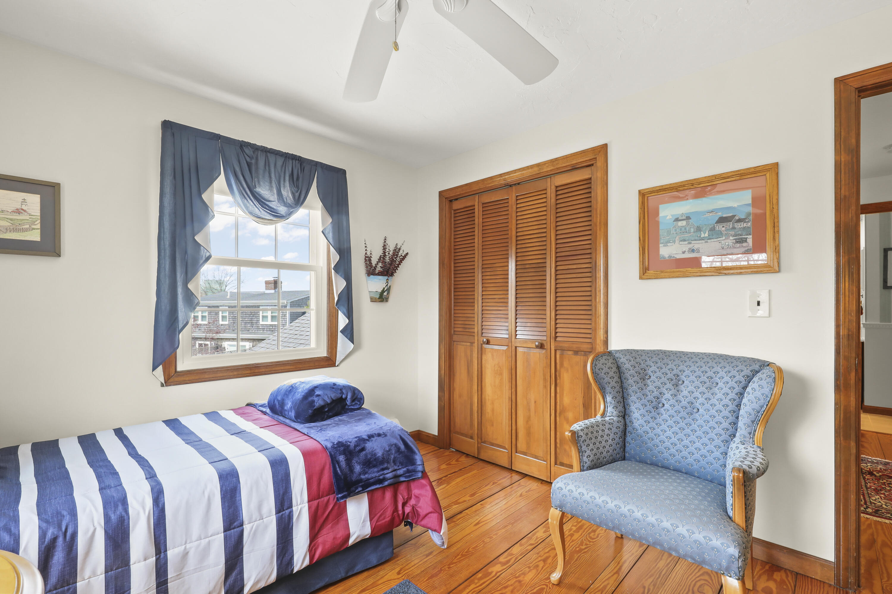 36 Town Neck Road Sandwich, MA 02563 - Photo 40 of 67 a bedroom with a bed couch and a window
