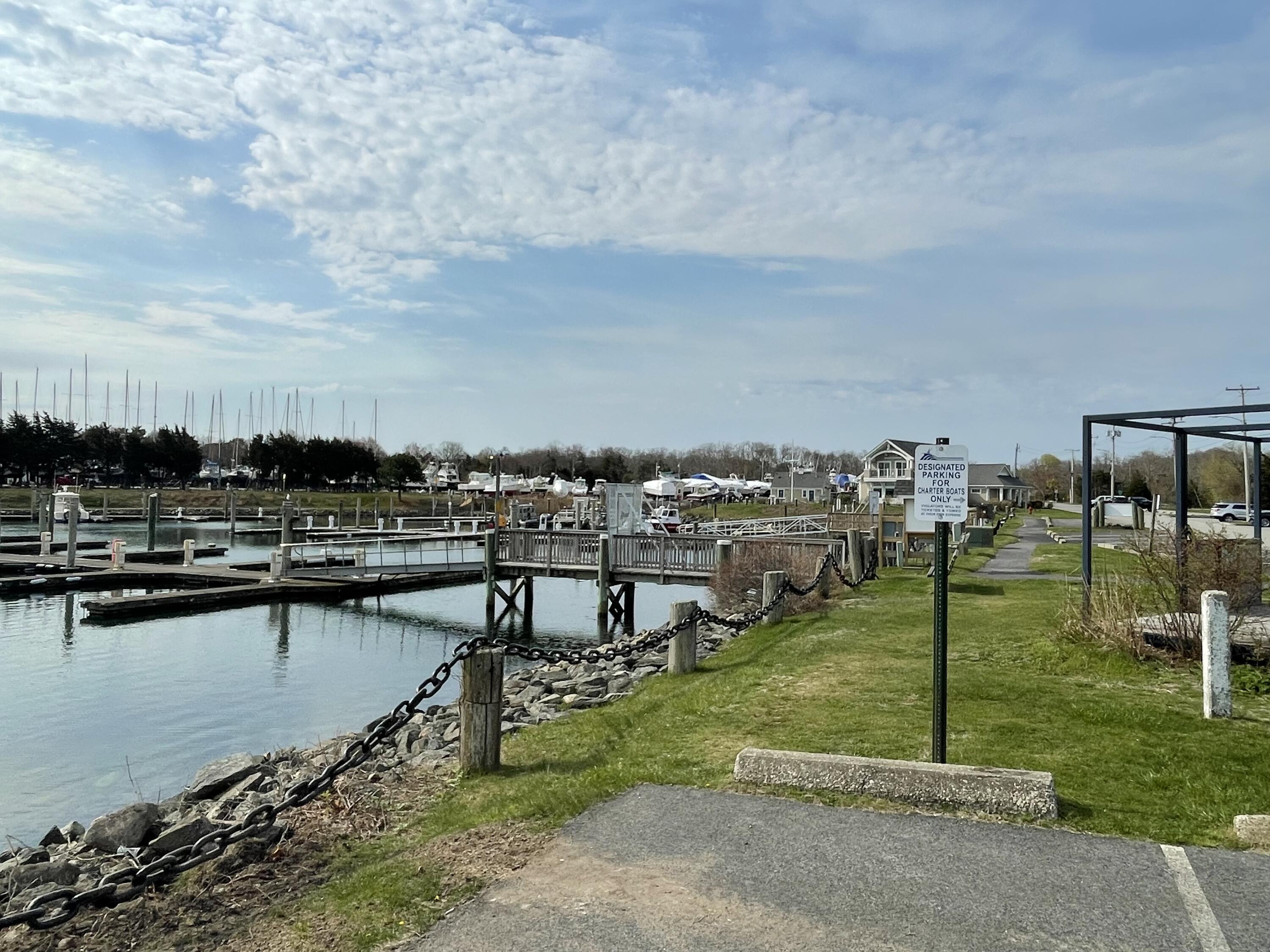 36 Town Neck Road Sandwich, MA 02563 - Photo 65 of 67 a view of a lake with a yard