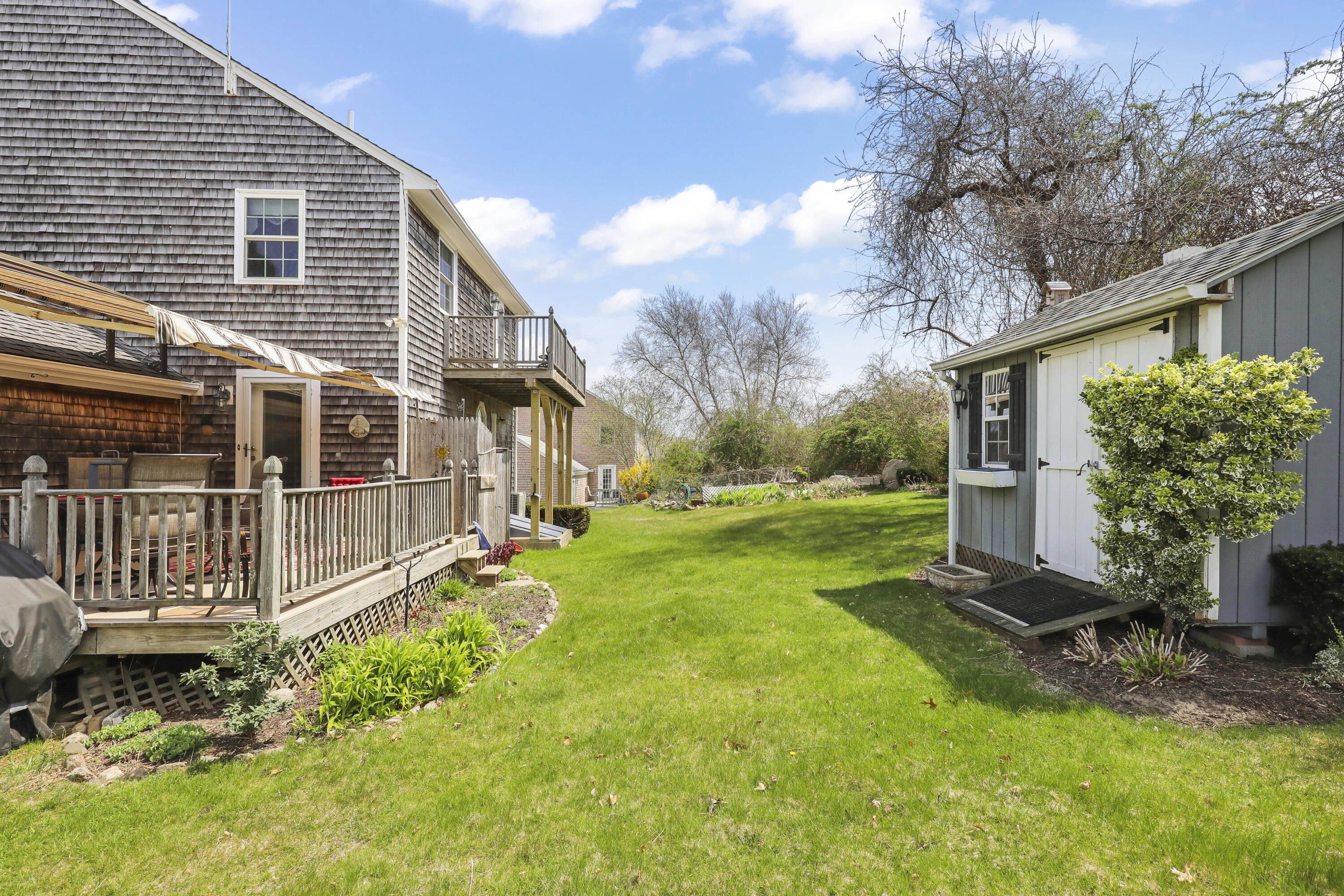 36 Town Neck Road Sandwich, MA 02563 - Photo 9 of 67 a view of a house with backyard and sitting area