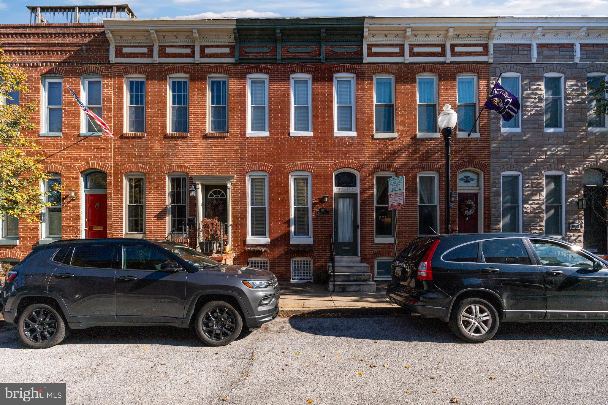 1043 Riverside Avenue Baltimore, MD 21230 - Photo 1 of 41 a car parked in front of a building