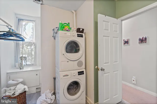 a utility room with dryer and washer