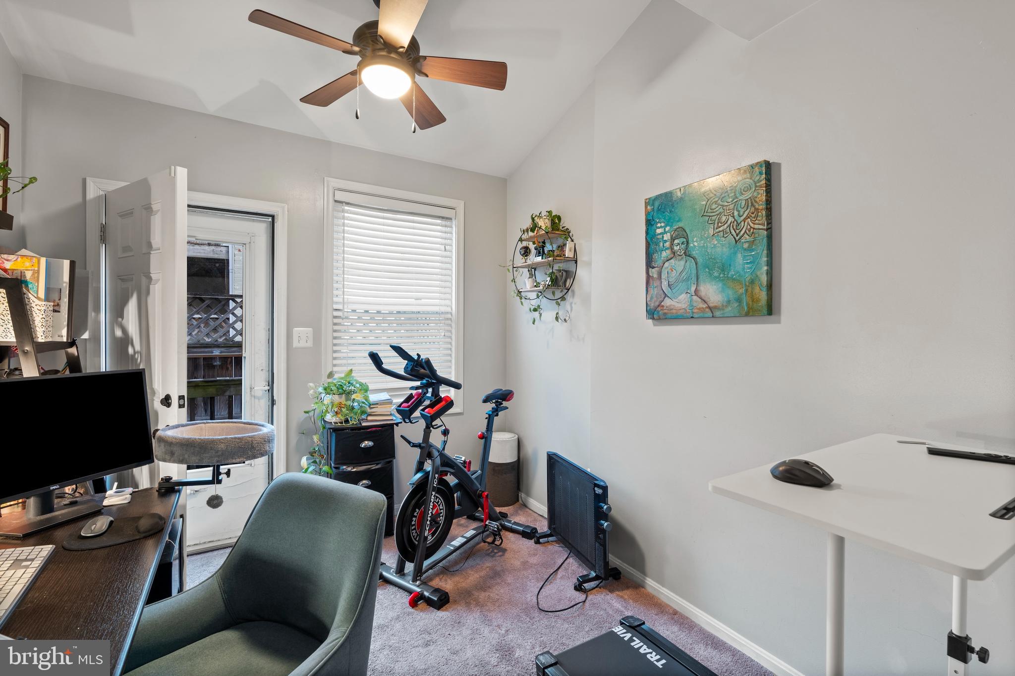1043 Riverside Avenue Baltimore, MD 21230 - Photo 18 of 41 a view of a workspace with furniture and a window