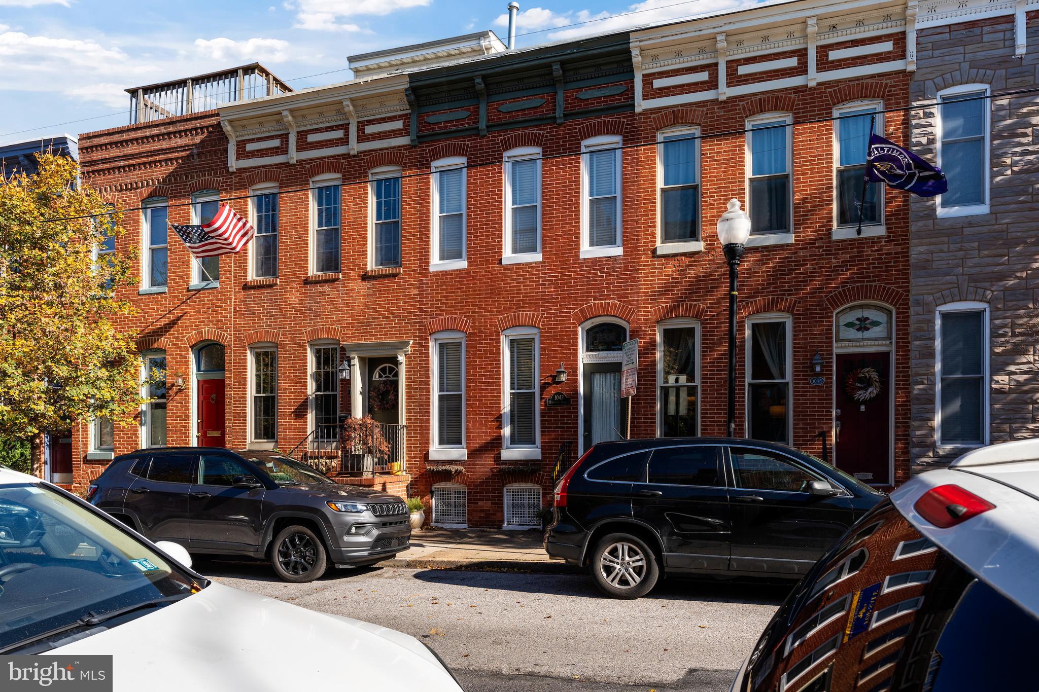 1043 Riverside Avenue Baltimore, MD 21230 - Photo 36 of 41 a view of a car parked in front of a building