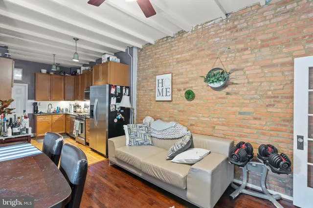 a living room with furniture and a table