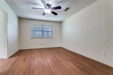 a bathroom with a sink vanity and a mirror