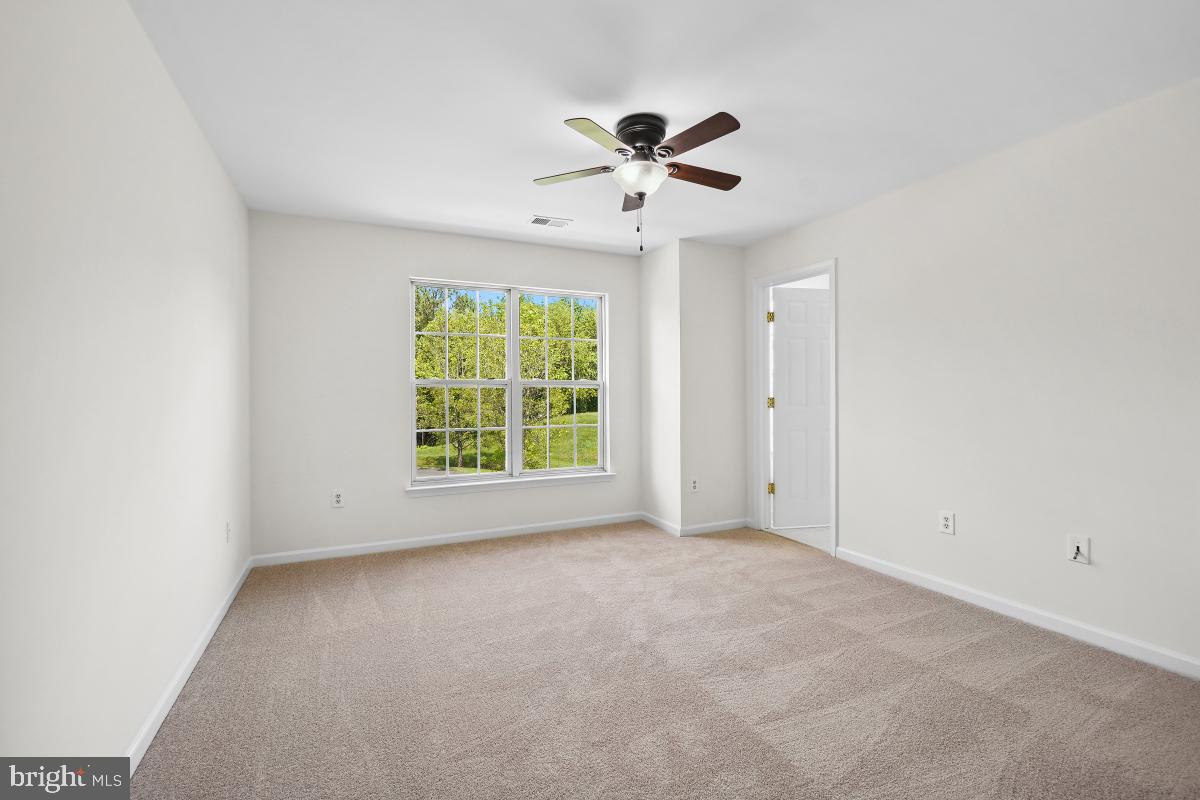 18521 Cornflower Road Boyds, MD 20841 - Photo 22 of 62 a view of an empty room with a window