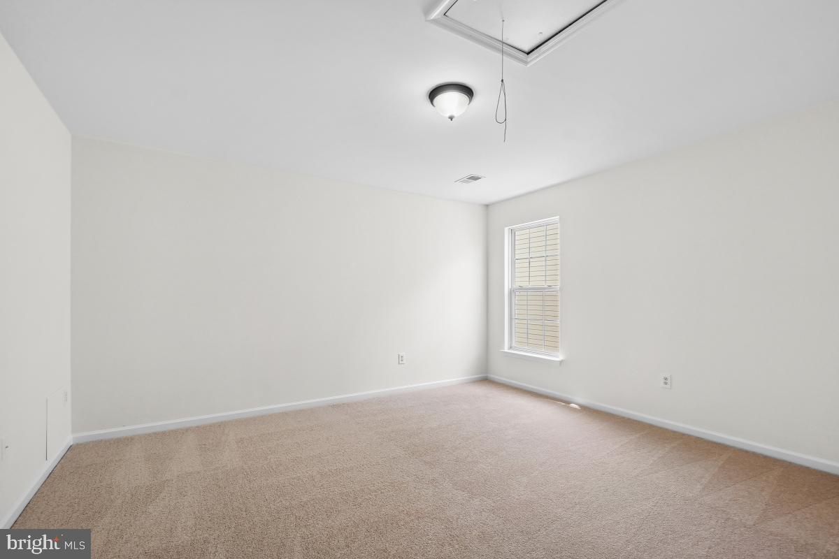 18521 Cornflower Road Boyds, MD 20841 - Photo 29 of 62 a view of an empty room with a window
