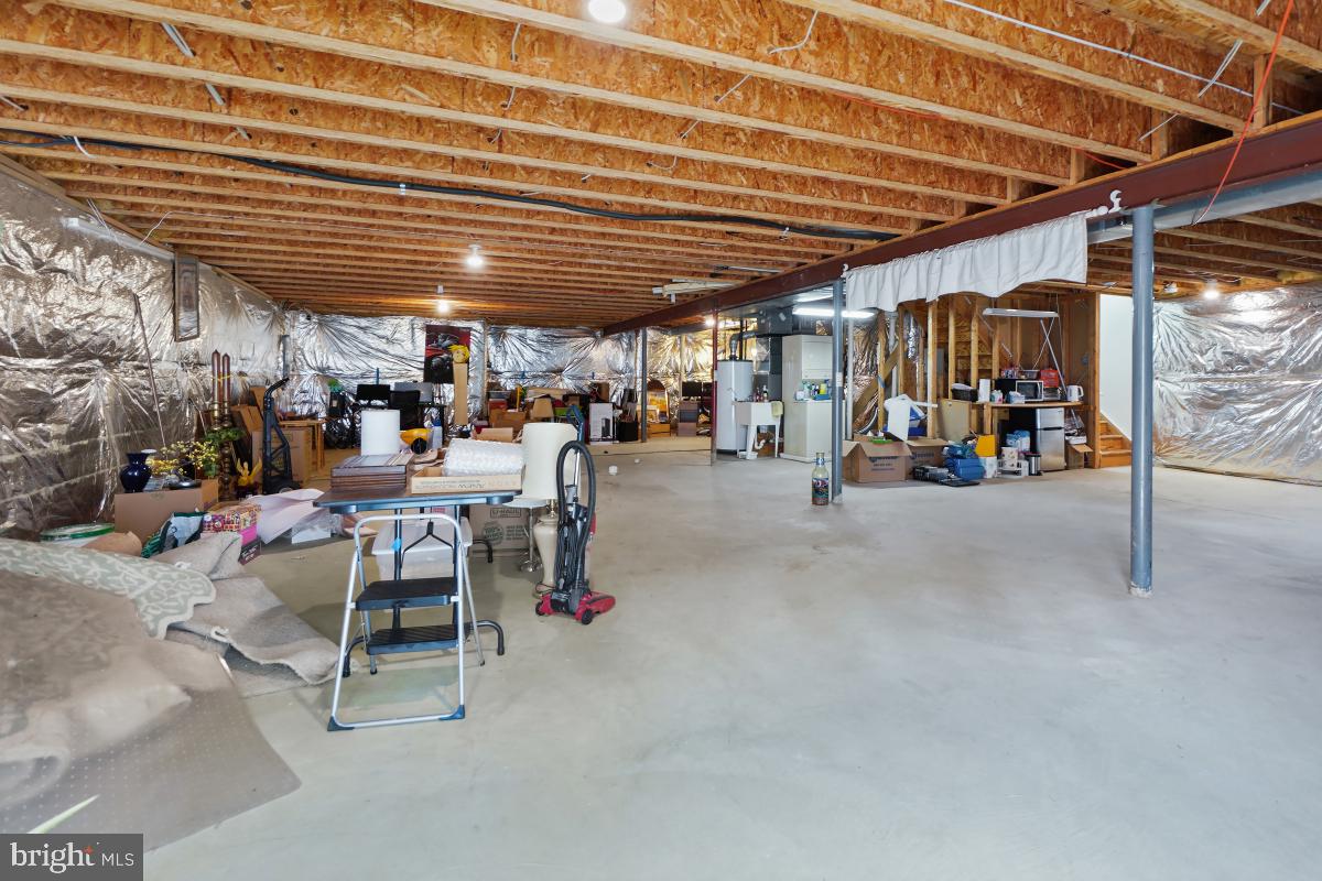 18521 Cornflower Road Boyds, MD 20841 - Photo 38 of 62 a view of a bike storage area