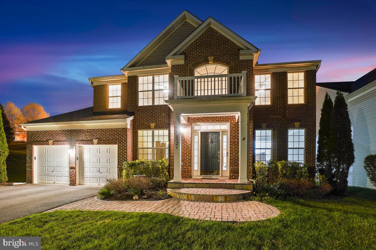 18521 Cornflower Road Boyds, MD 20841 - Photo 40 of 62 front view of a house with a yard