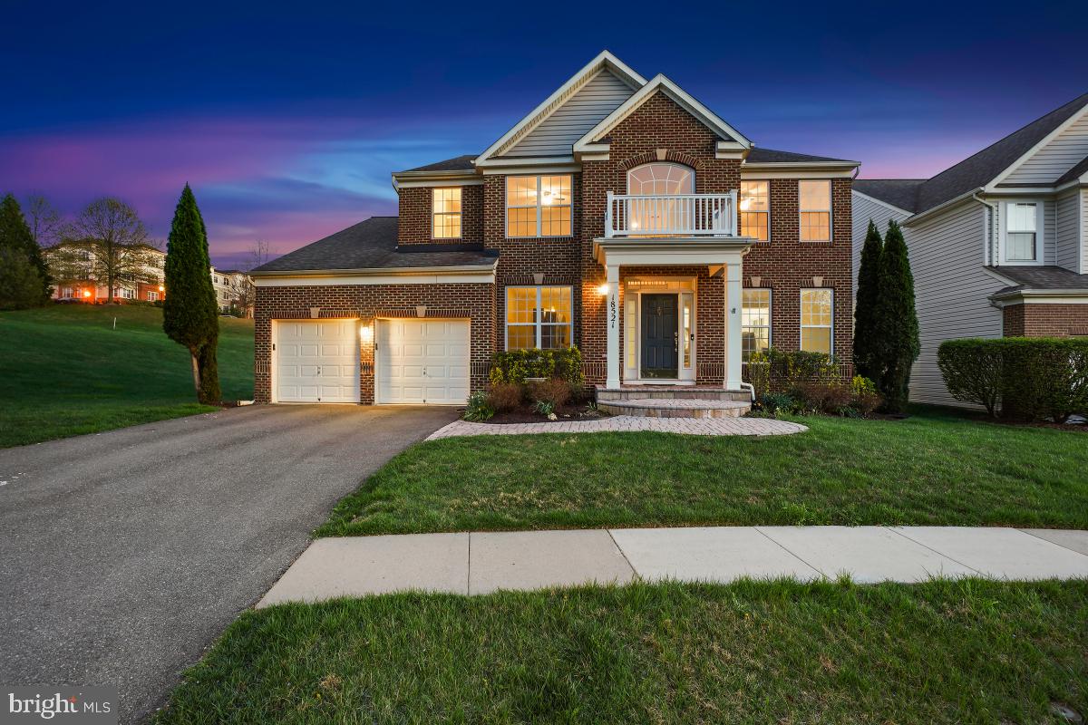 18521 Cornflower Road Boyds, MD 20841 - Photo 41 of 62 a front view of a house with a yard