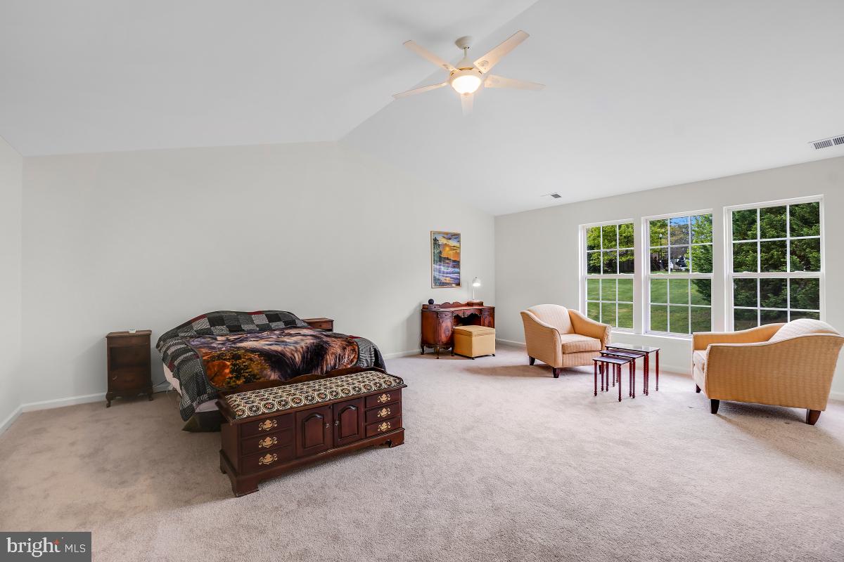 18521 Cornflower Road Boyds, MD 20841 - Photo 60 of 62 a living room with furniture and a window