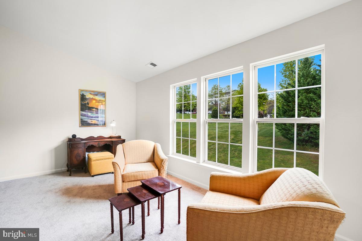 18521 Cornflower Road Boyds, MD 20841 - Photo 62 of 62 a living room with furniture and a window