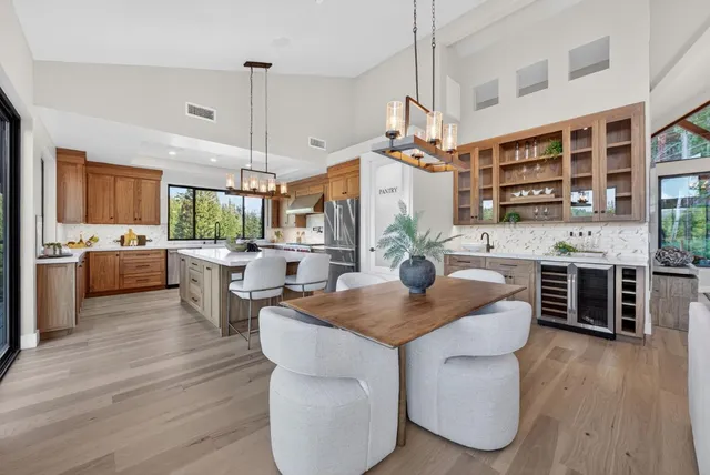 a bathroom with a sink double vanity and a mirror