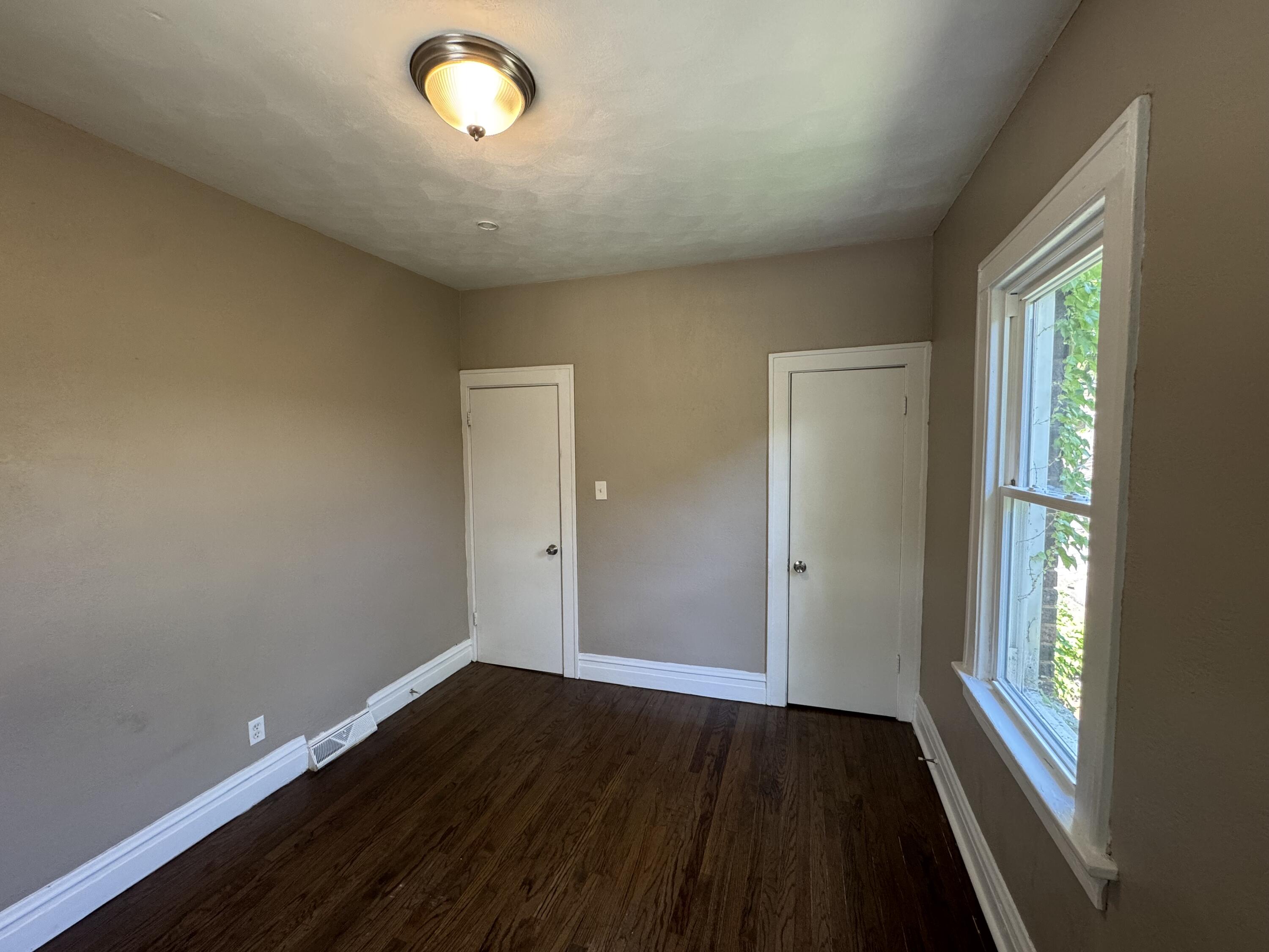 3844 Adams Street Gary, IN 46408 - Photo 9 of 17 a view of an empty room and window