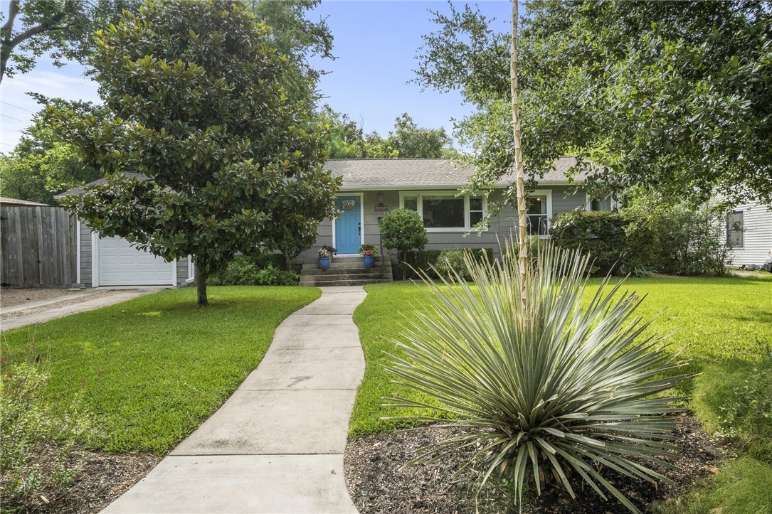 5805 Bull Creek Road Austin, TX 78756 - Photo 1 of 1 a front view of house with yard and green space