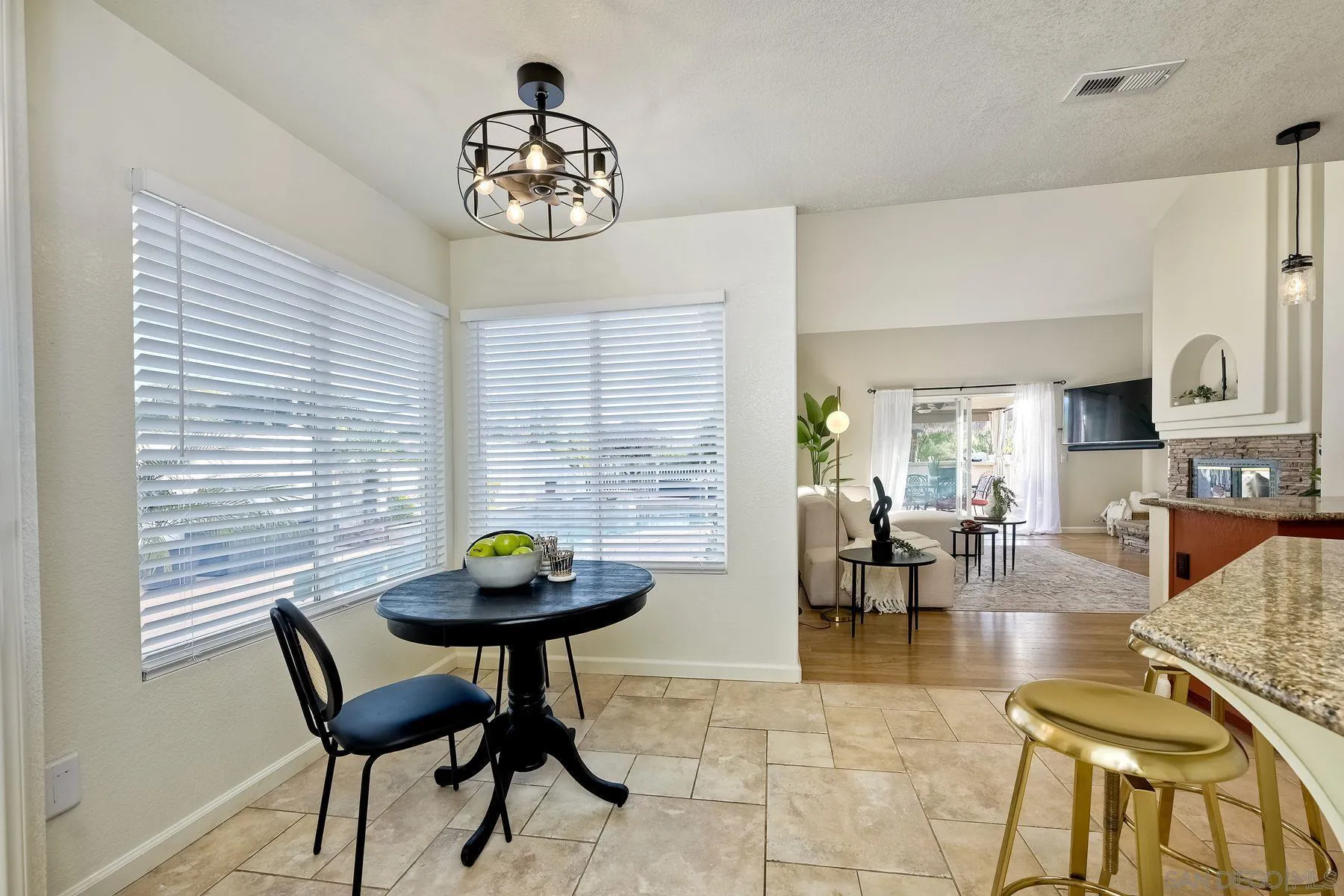 2859 Manzanita View Road Alpine, CA 91901 - Photo 24 of 66 a view of a dining room with furniture and wooden floor