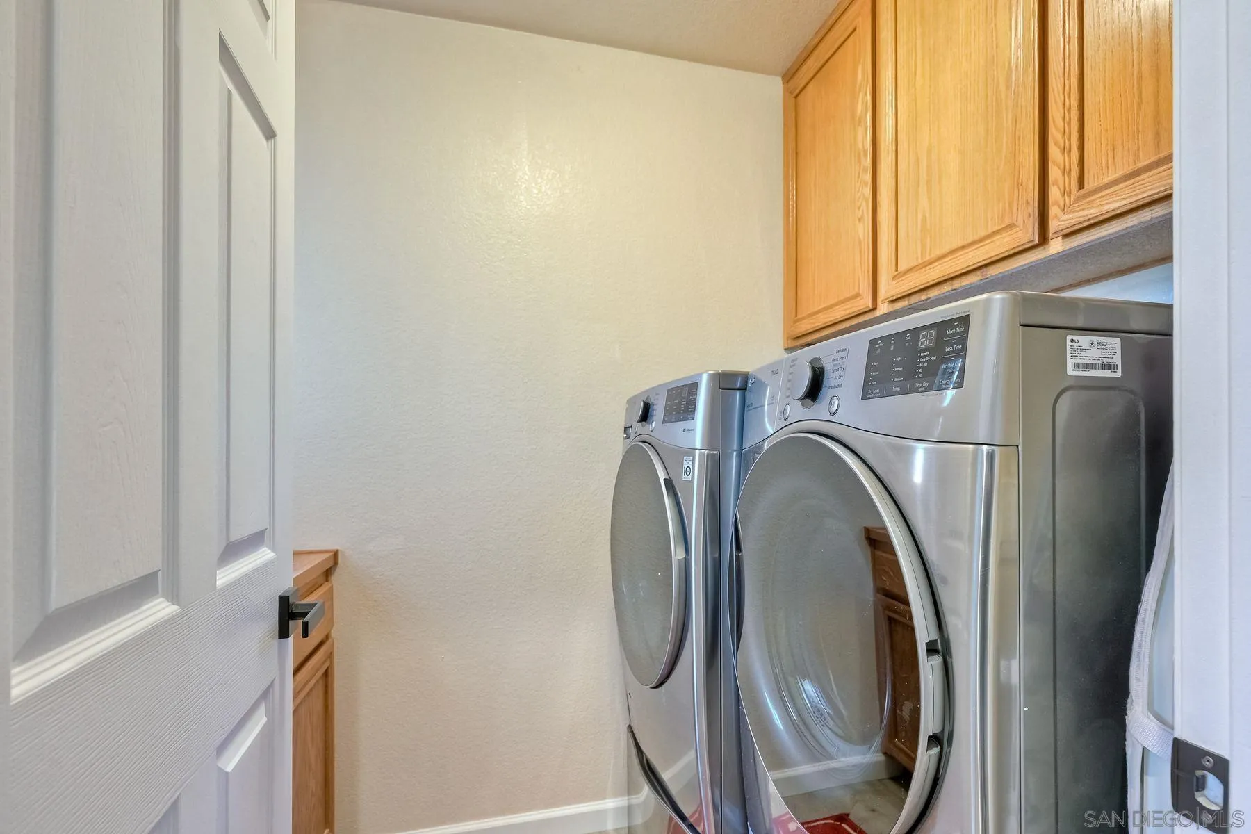 2859 Manzanita View Road Alpine, CA 91901 - Photo 39 of 66 a utility room with dryer and washer