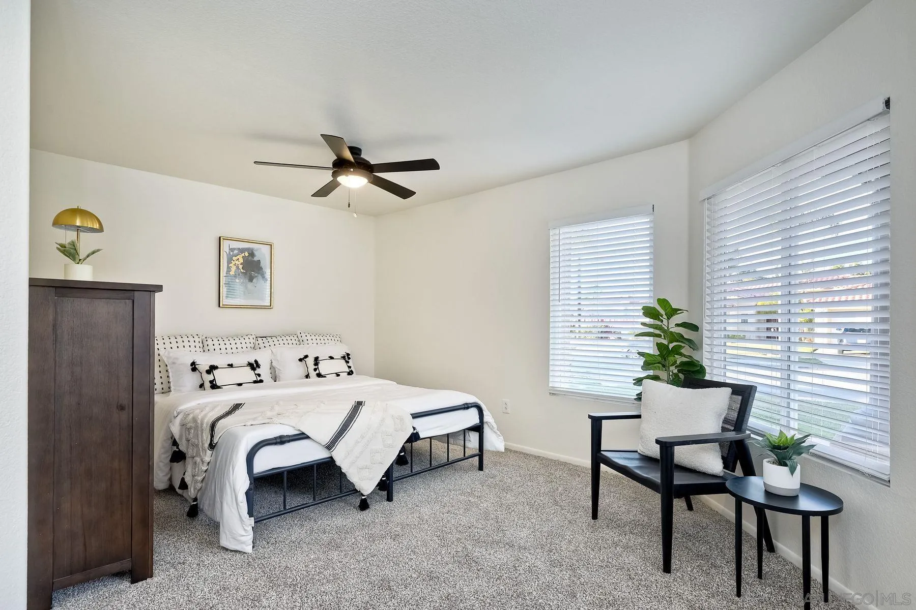 2859 Manzanita View Road Alpine, CA 91901 - Photo 40 of 66 a bedroom with a bed table chair and a window