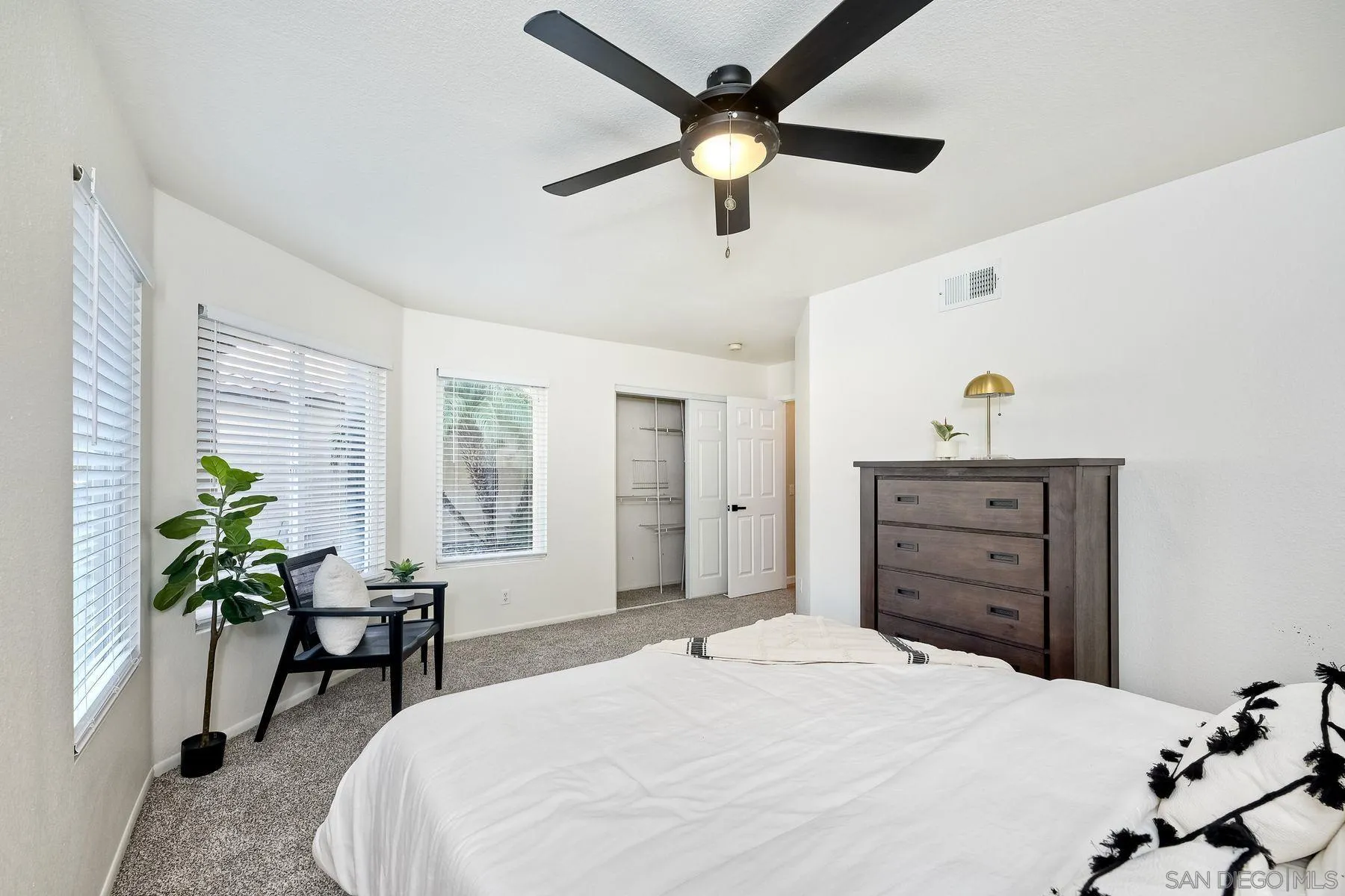 2859 Manzanita View Road Alpine, CA 91901 - Photo 41 of 66 a bedroom with a bed and a dresser