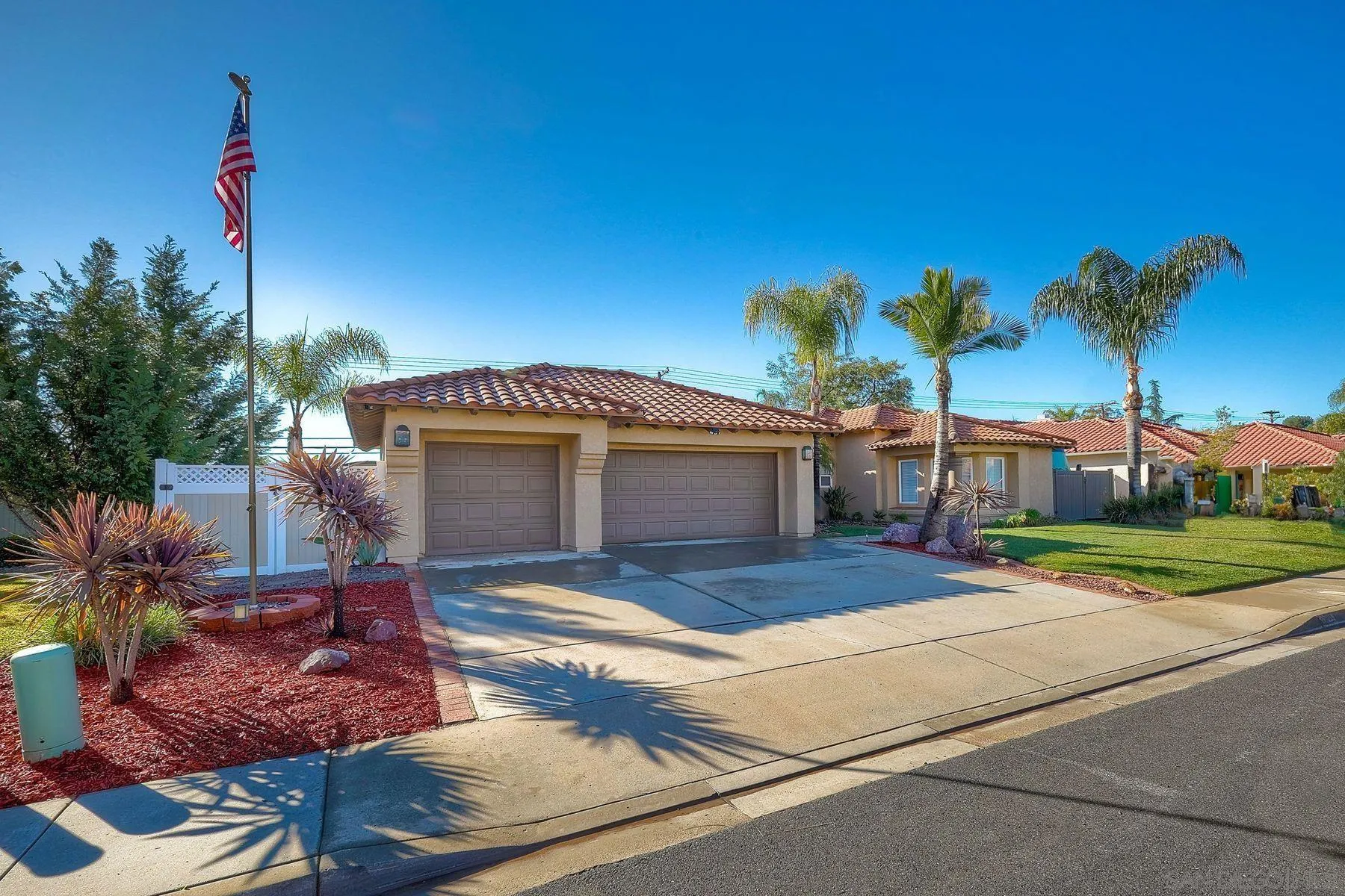 2859 Manzanita View Road Alpine, CA 91901 - Photo 61 of 66 a front view of a house with a yard and garage