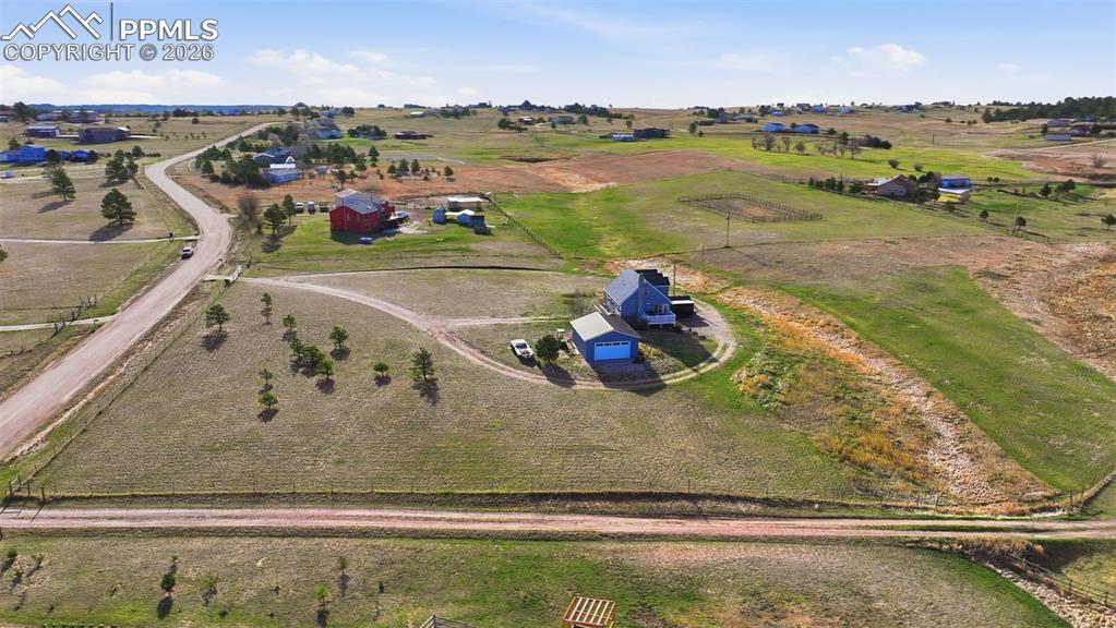 12285 Old Barn Road Elbert, CO 80106 - Photo 32 of 39 a view of a swimming pool and lake view