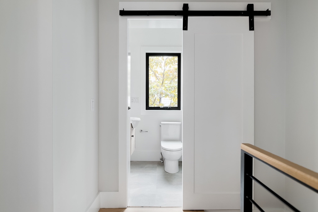 8 Poplar Road, Unit A Cambridge, MA 02138 - Photo 12 of 35 a bathroom with a toilet