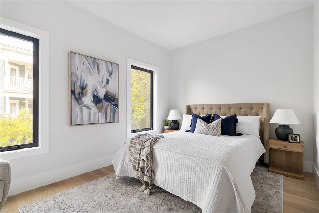 8 Poplar Road, Unit A Cambridge, MA 02138 - Photo 15 of 35 a bedroom with bed and window