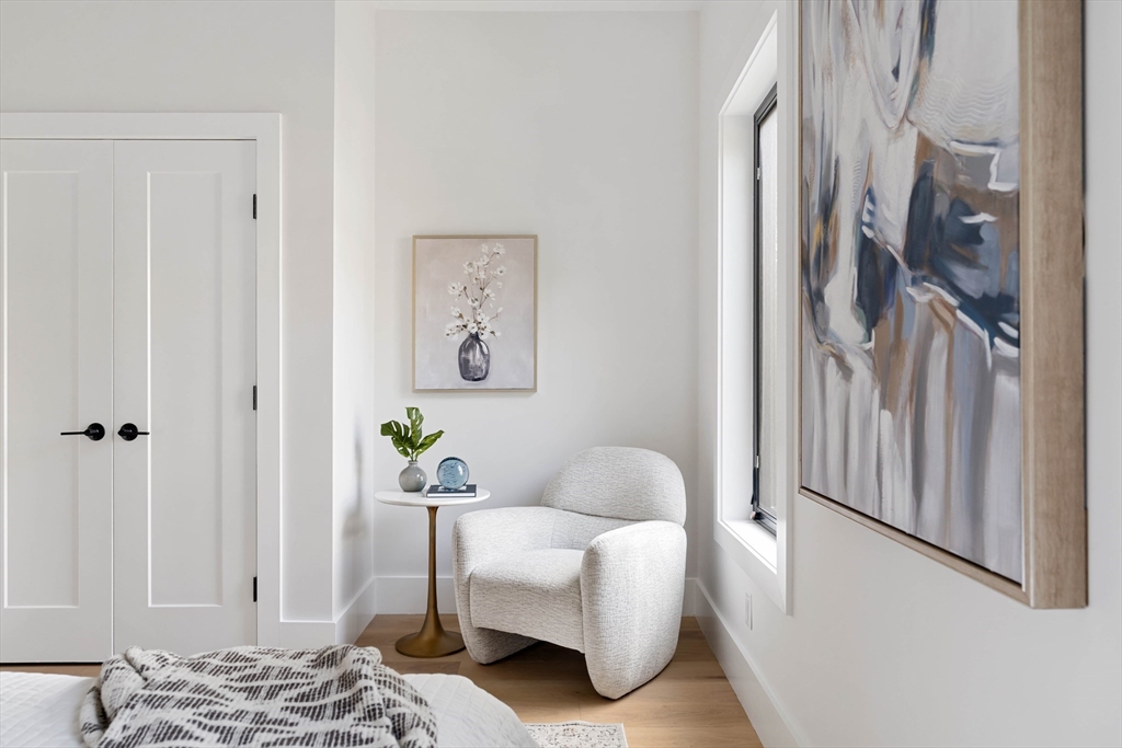 8 Poplar Road, Unit A Cambridge, MA 02138 - Photo 17 of 35 a living room with furniture and a window