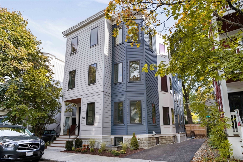 8 Poplar Road, Unit A Cambridge, MA 02138 - Photo 34 of 35 a front view of a house with parking