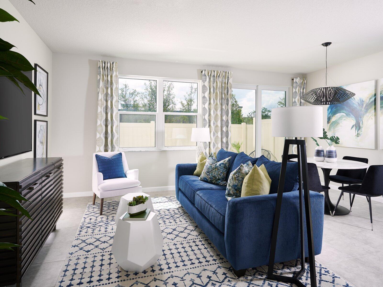 12949 Southwest Forli Way Port St. Lucie, FL 34987 - Photo 6 of 13 a living room with furniture and a large window