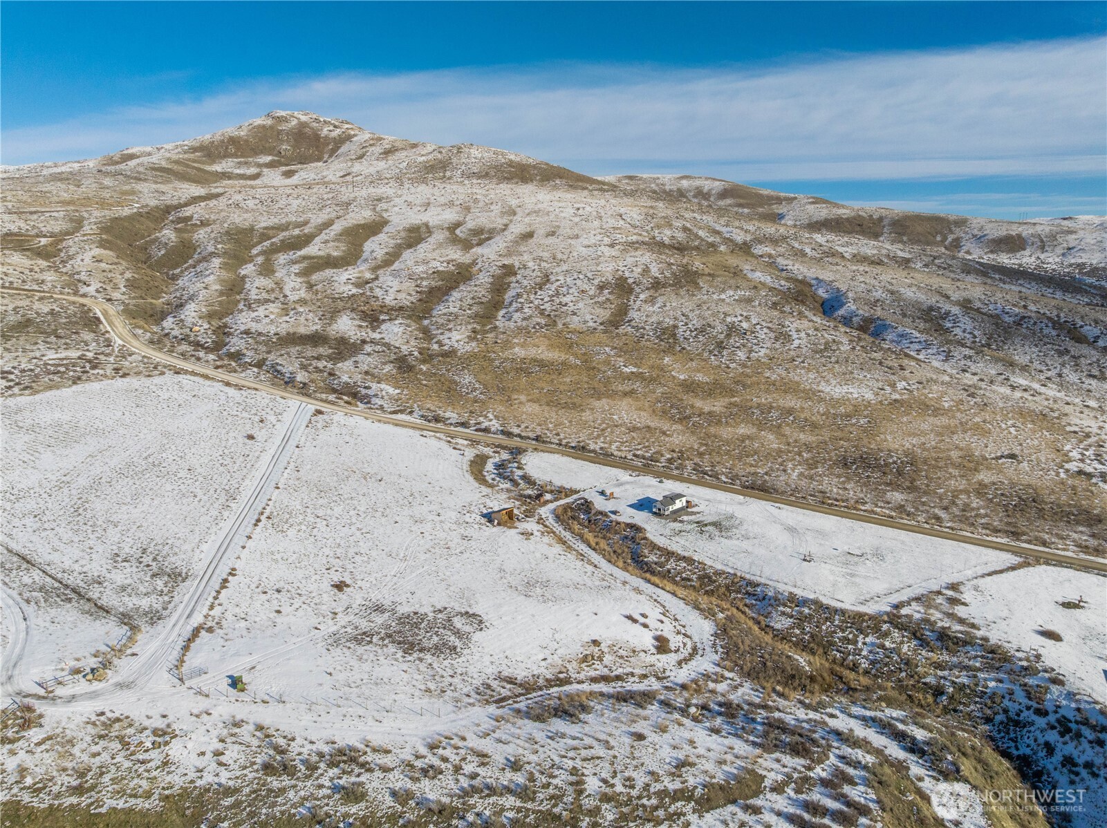 577 Bill Shaw Road Pateros, WA 98846 - Photo 35 of 40 a view of a dry yard with wooden fence