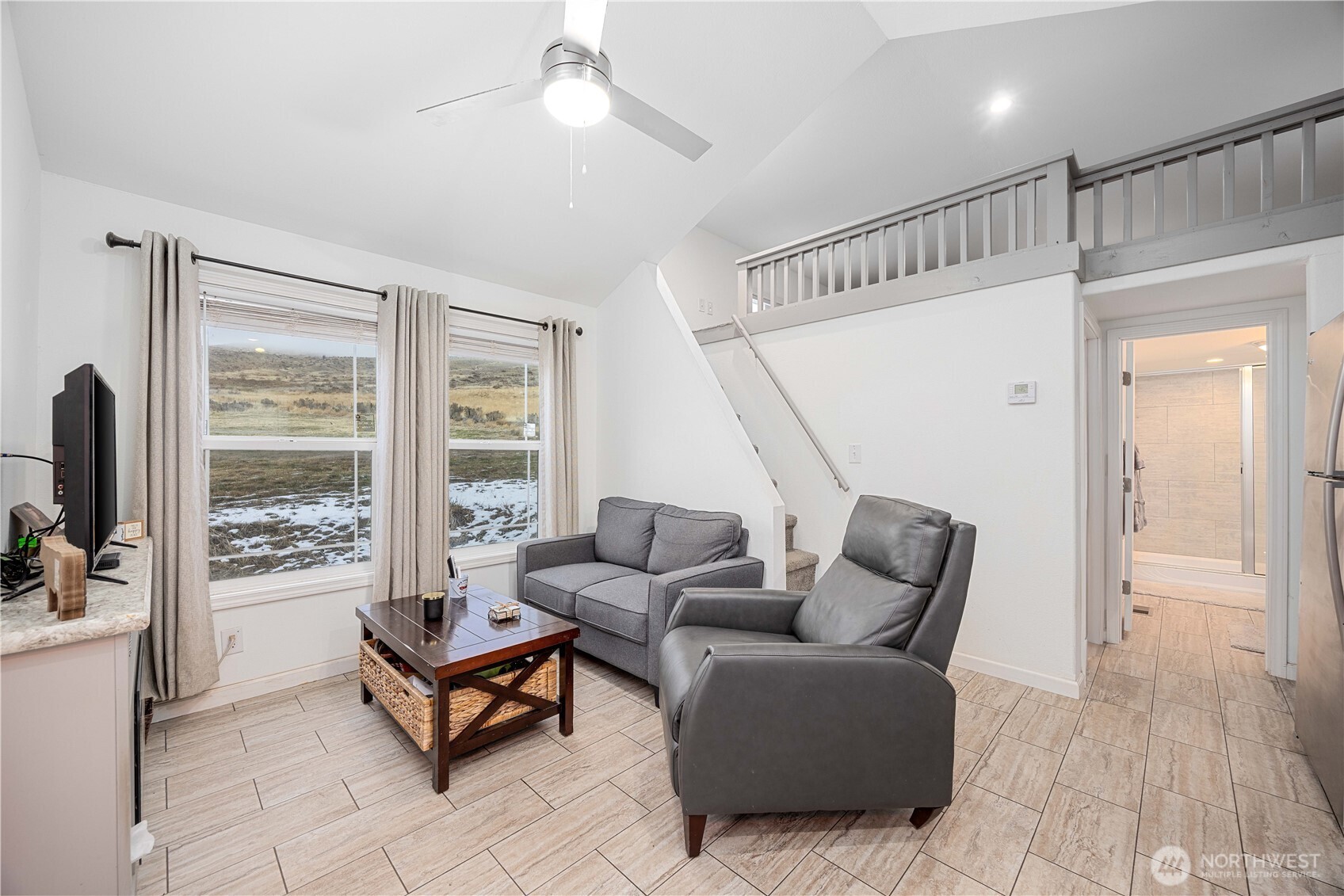 577 Bill Shaw Road Pateros, WA 98846 - Photo 7 of 40 a living room with furniture and a window