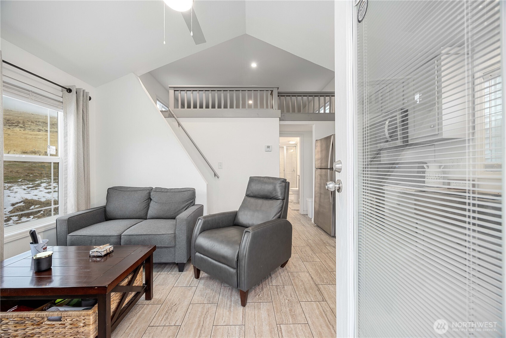577 Bill Shaw Road Pateros, WA 98846 - Photo 10 of 40 a living room with furniture and a rug