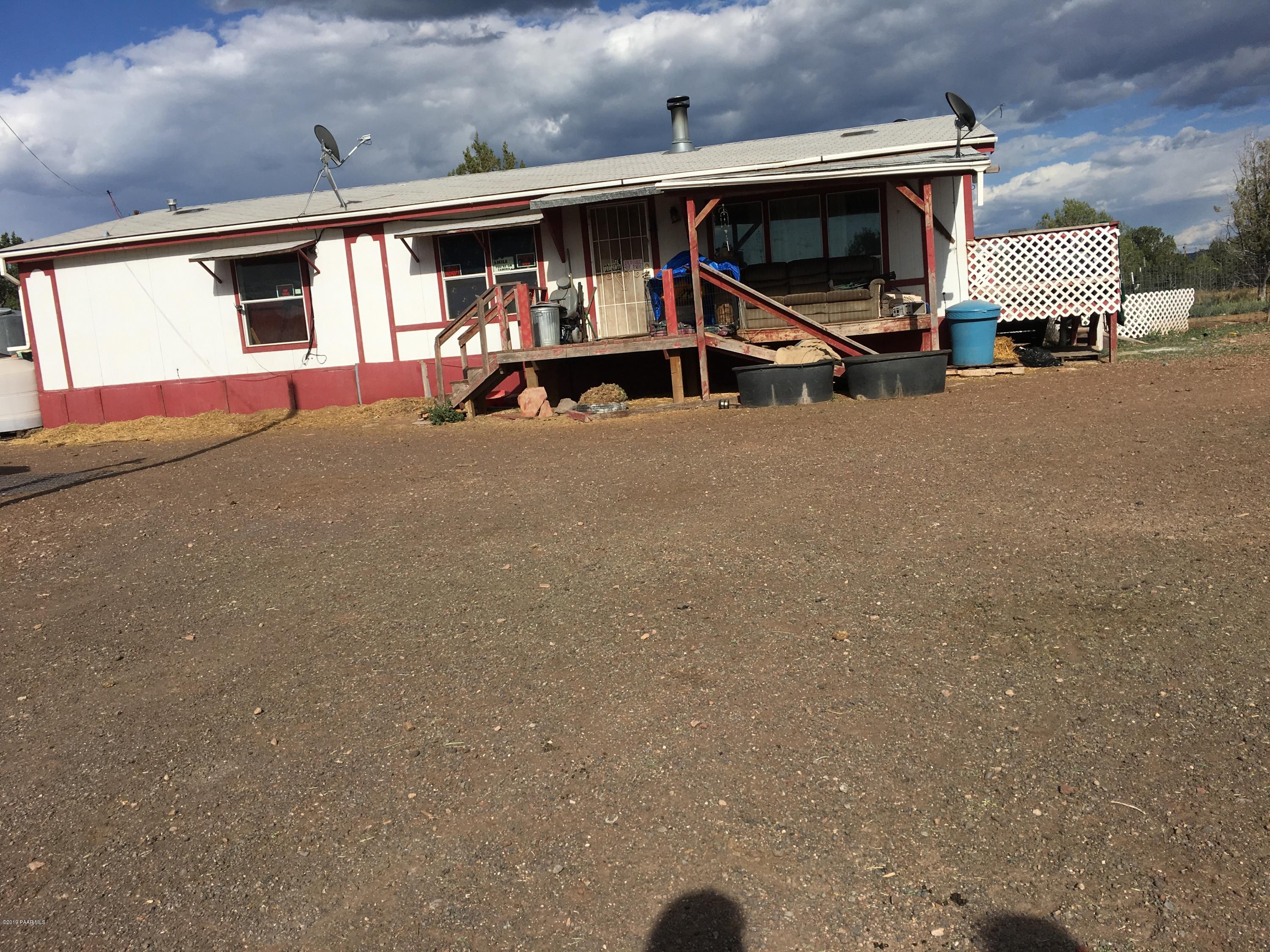 3467 Double A Ranch Road Williams, AZ 86046 - Photo 1 of 19 a view of a car garage