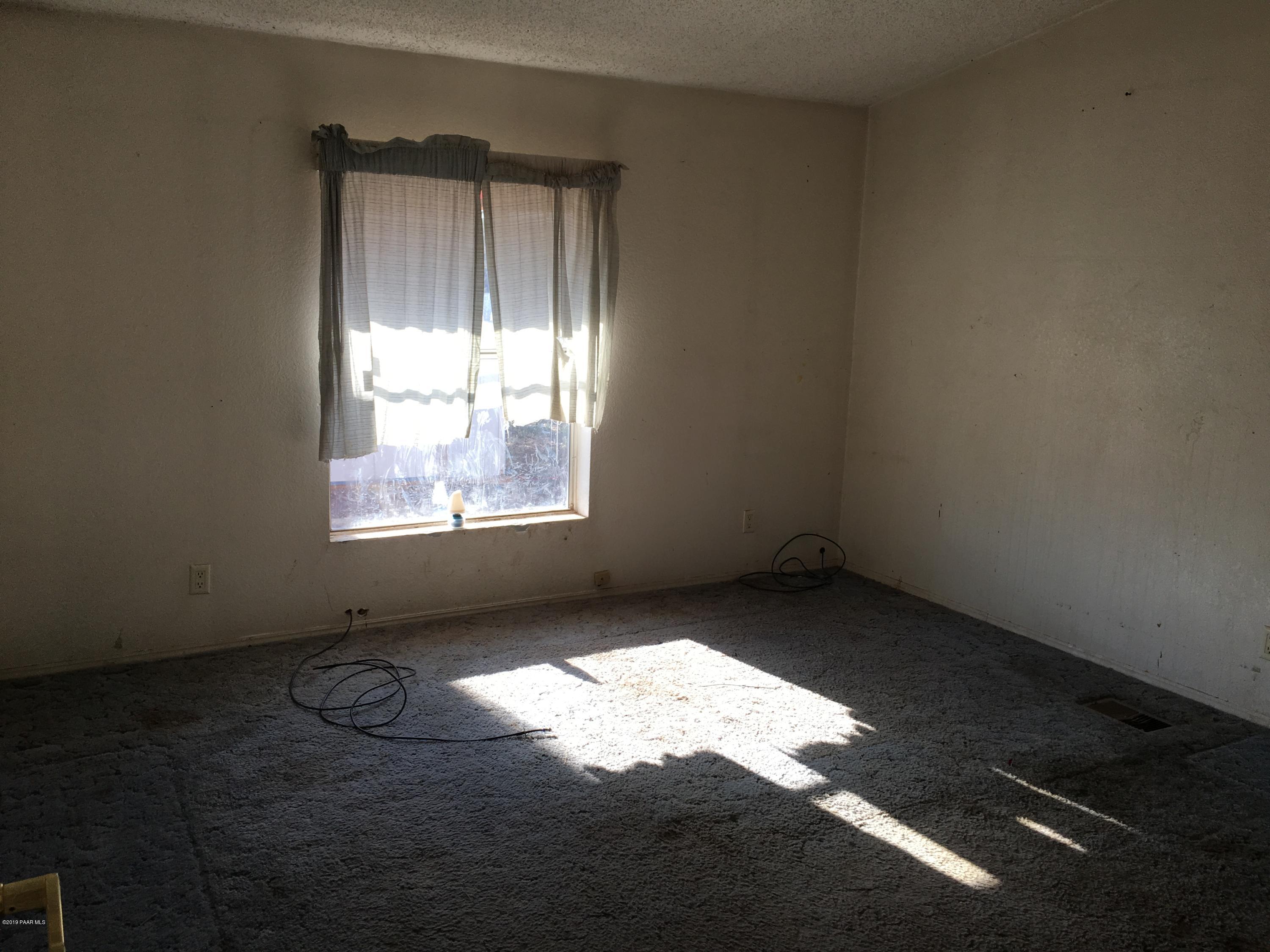 3467 Double A Ranch Road Williams, AZ 86046 - Photo 13 of 19 an empty room with windows