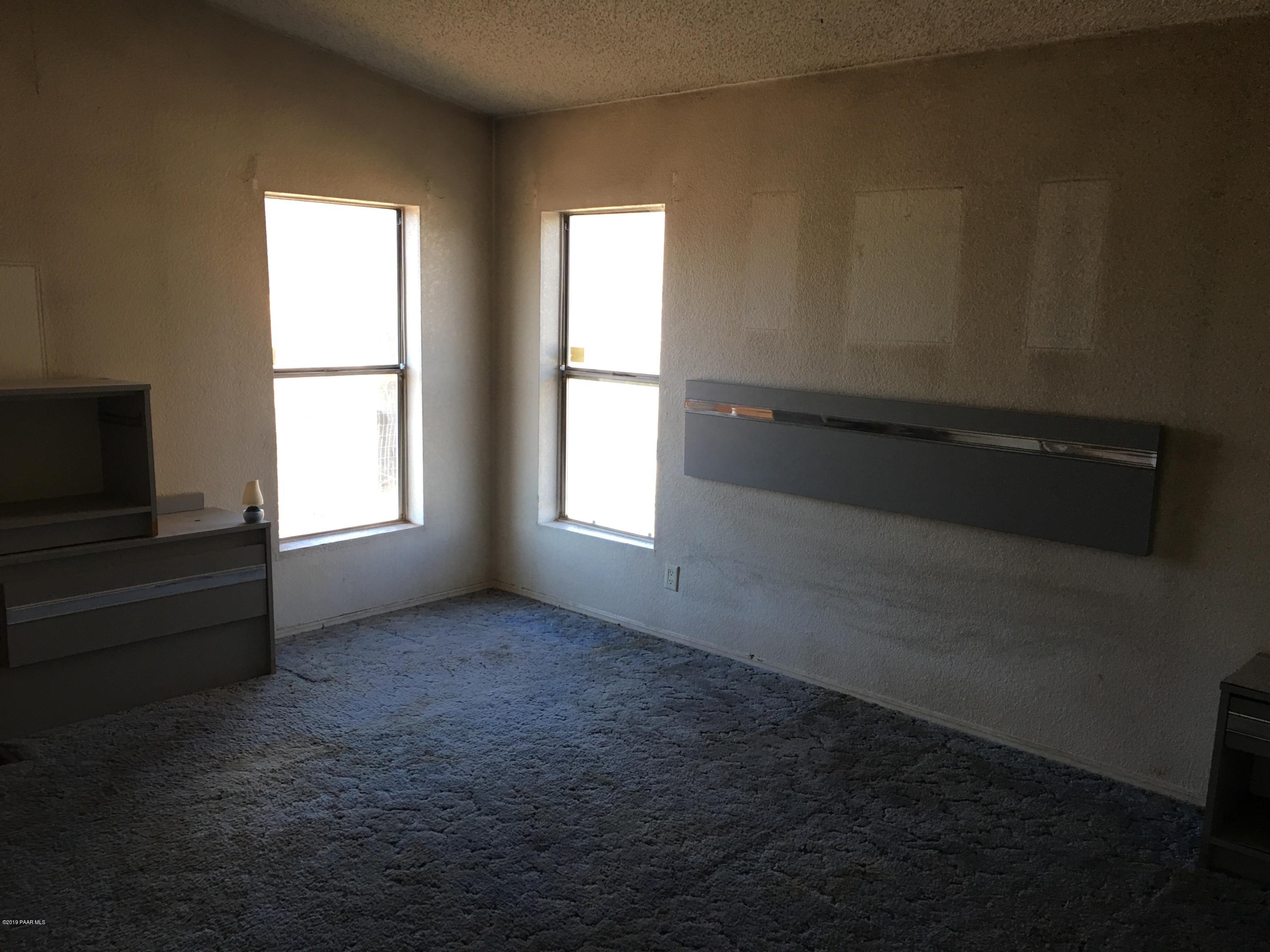 3467 Double A Ranch Road Williams, AZ 86046 - Photo 14 of 19 an empty room with windows