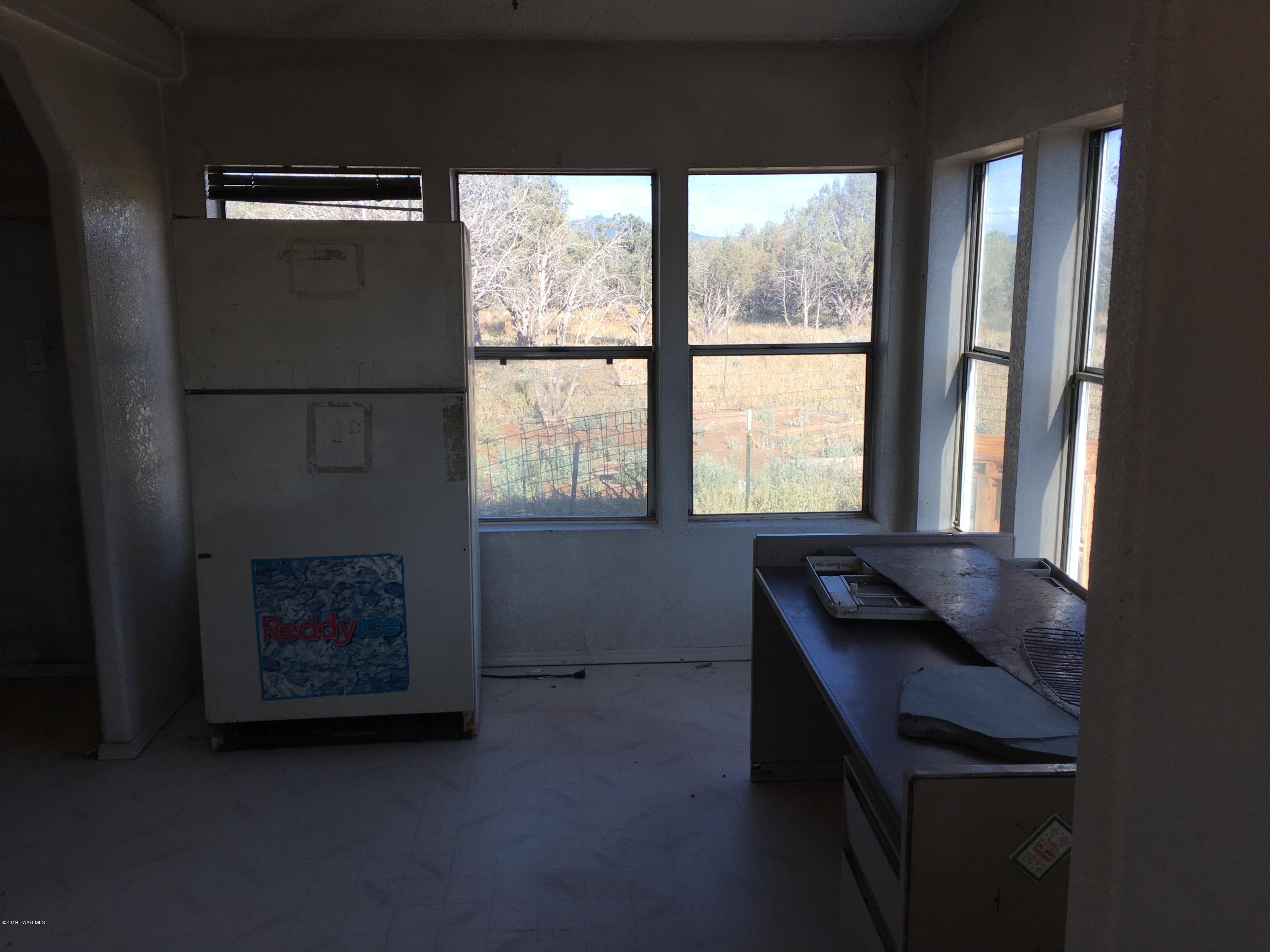 3467 Double A Ranch Road Williams, AZ 86046 - Photo 6 of 19 a living room with furniture and a window