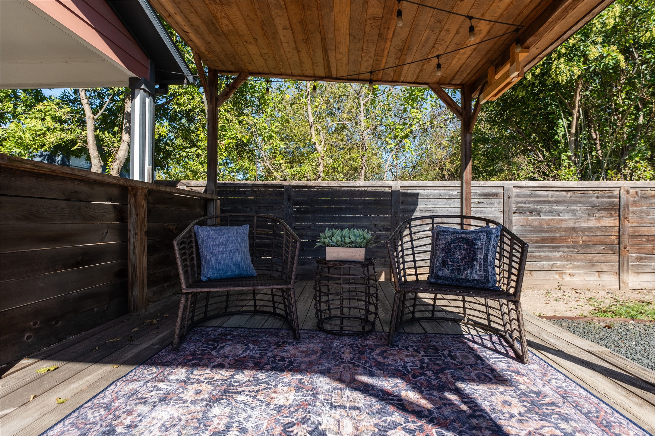 7601 Bethune Avenue, Unit B Austin, TX 78752 - Photo 33 of 39 Wooden deck with a fenced backyard