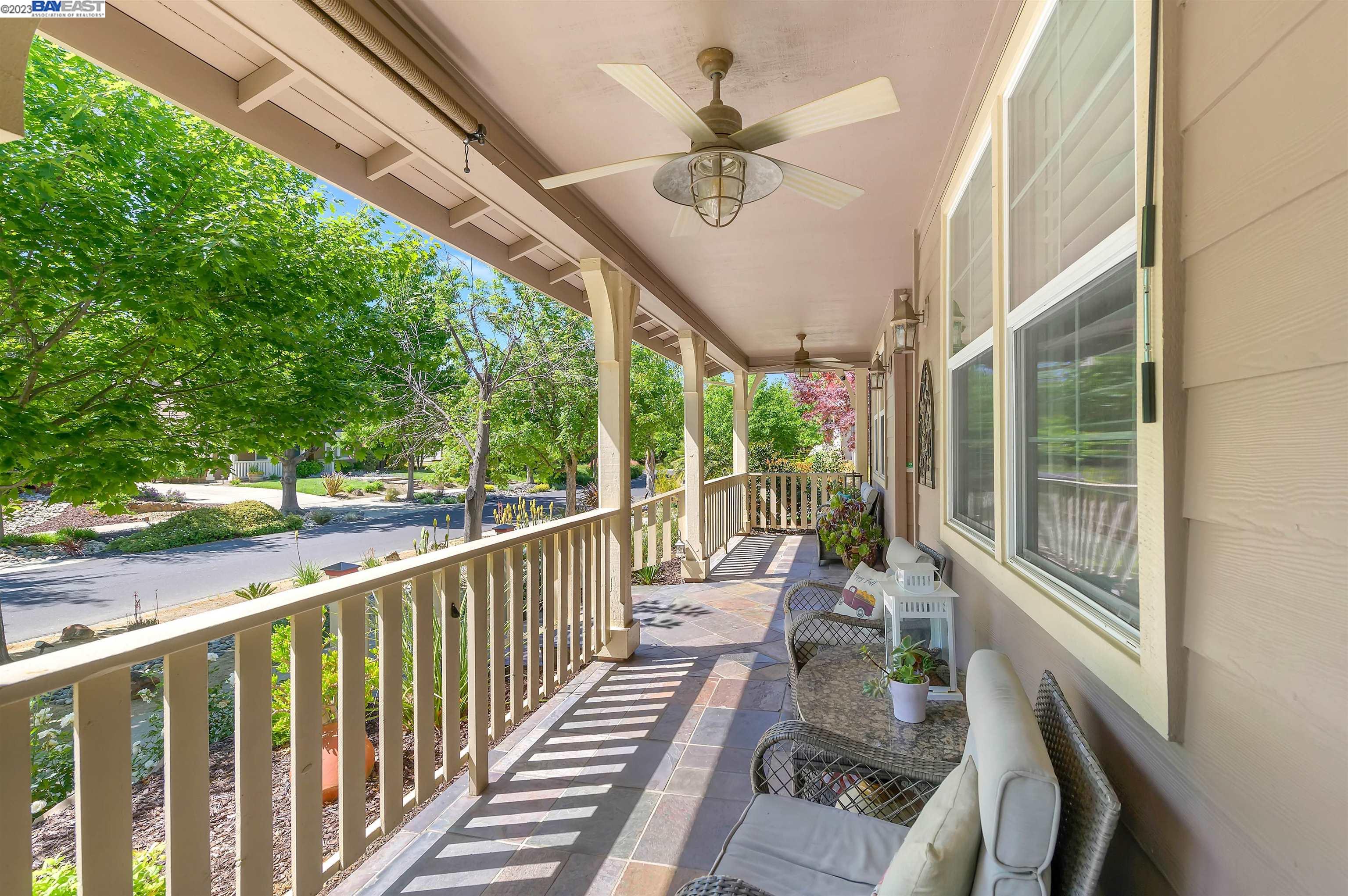 a view of balcony with furniture