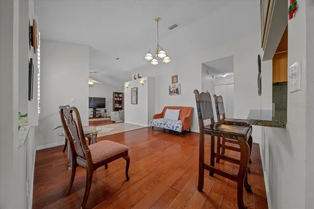 a aerial view of a house with a yard