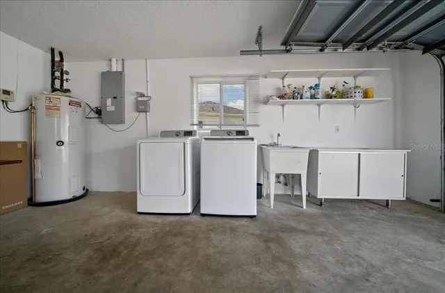 an aerial view of a house with a garden