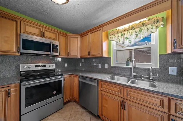 a living room with furniture dining room and wooden floor