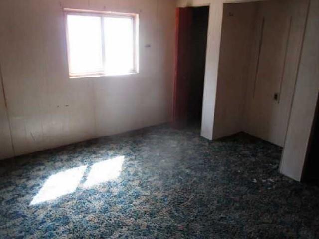 314 1/2 Lowell Street Vandergrift, PA 15690 - Photo 5 of 8 an empty room with a window