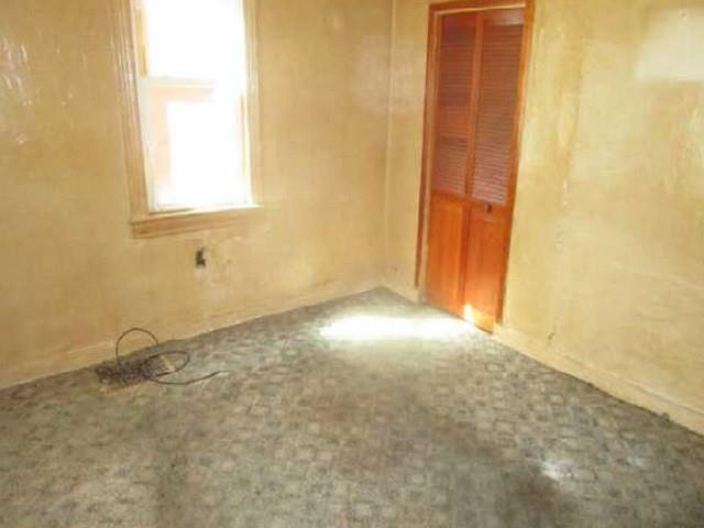 314 1/2 Lowell Street Vandergrift, PA 15690 - Photo 6 of 8 an empty room with a window