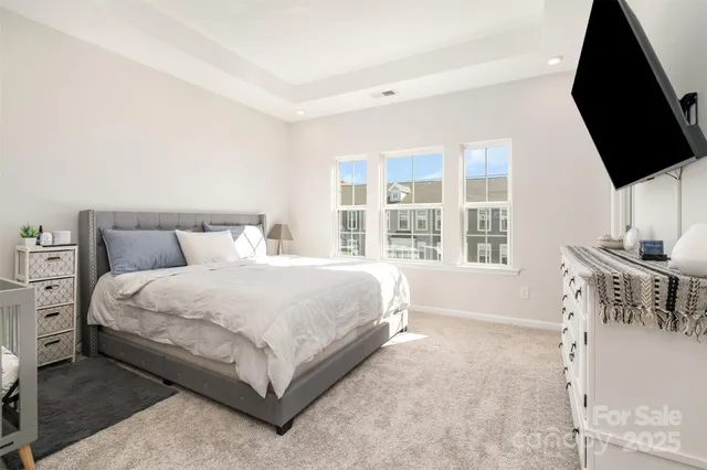 a bathroom with a double vanity sink and mirror